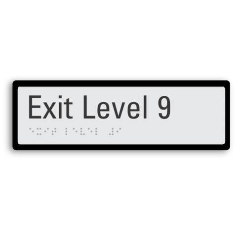 exit level 9 signage with braille tactile elements and black border for enhanced contrast