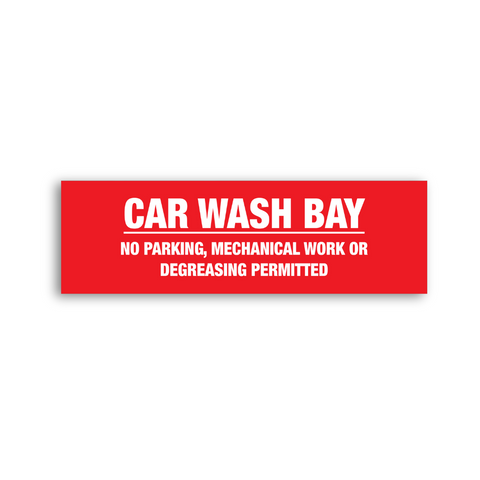 a red Car Wash Bay sign saying no parking, mechanical work or degreasing permitted