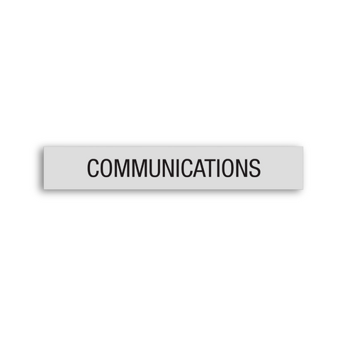 a gray Communications sign