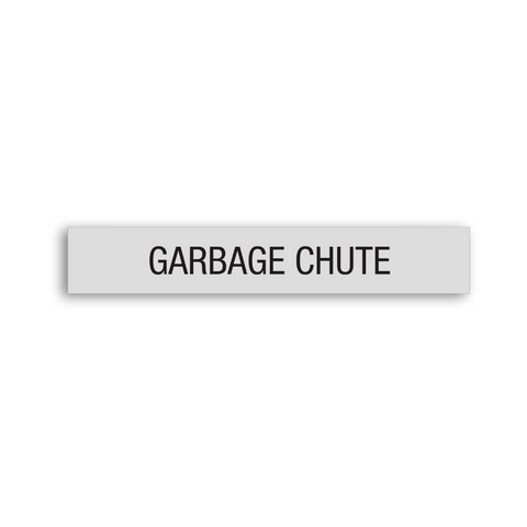 a gray Garbage Chute sign