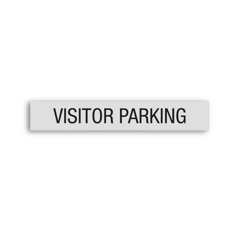 a regulatory sign saying Visitor Parking