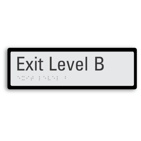 exit level B (basement) sign with braille tactile elements and black border for enhanced contrast