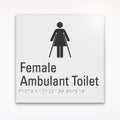 a gray braille and tactile sign for female ambulant toilet