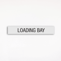 a regulatory signage saying loading bay