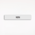 a gray NBN room sign