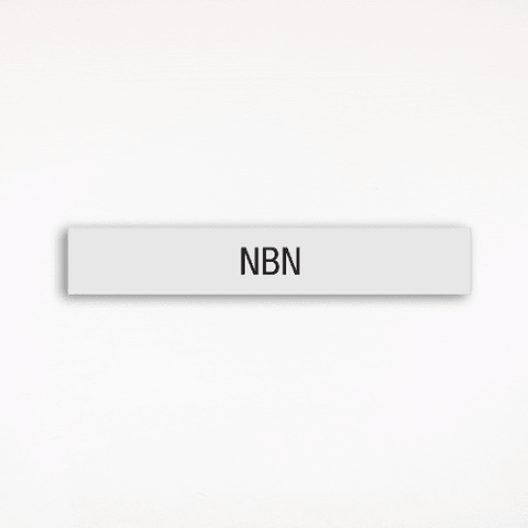a gray NBN room sign