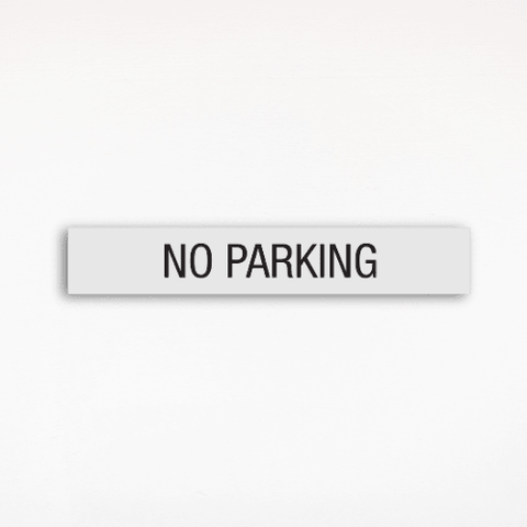 a regulatory sign saying no parking