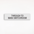 a regulatory sign saying Through To Main Switchroom
