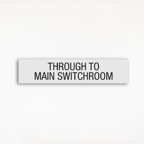a regulatory sign saying Through To Main Switchroom
